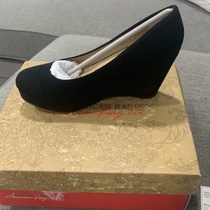 Black wedge, brand new in the box